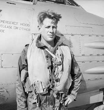 A33624 Sergeant (later Pilot Officer) Vance Drummond, of No. 77 Squadron RAAF beside his Gloster Meteor F.8 aircraft, Kimpo, South Korea. 1951 Australian War Memorial JK0163 