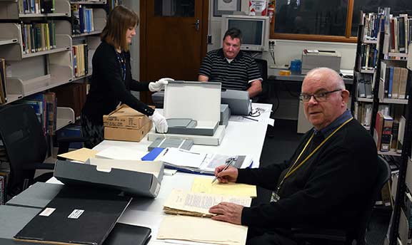 Researchers accessing archival collections in the Reading Room at the Air Force Museum of New Zealand.