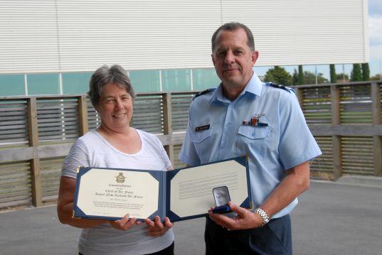 Receiving her second Chief of Air Force Commendation from then Chief of Air Force, Air Vice-Marshal Mike Yardley.