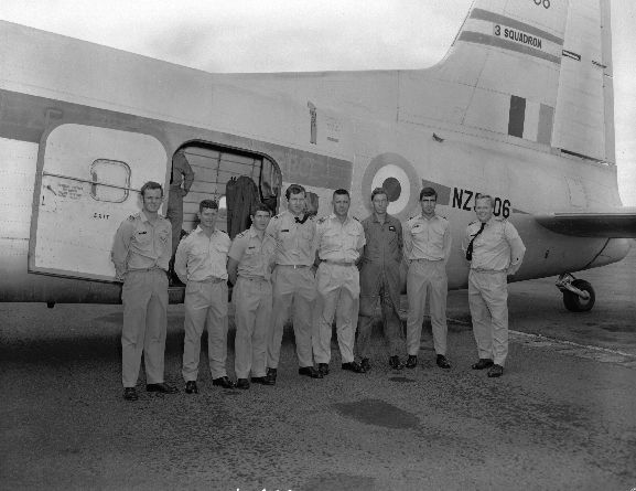 Group of No. 75 Squadron officers pose beside No. 3 Squadron Bristol Freighter NZ5906, before leaving for the USA to convert to Skyhawks. RNZAF Base Ohakea.
L-R: Fred (Graeme) Thompson, John Scrimshaw, Ken Cox, Murray Abel, Laurie Lawless (Navigator & Admin), Trevor Bland, Mike Callanan, Ross Ewing. People missing are Roger Henstock, Ken Gayfer, John Woolford. 
All names supplied by Squadron Leader Jim Jennings, 2004.