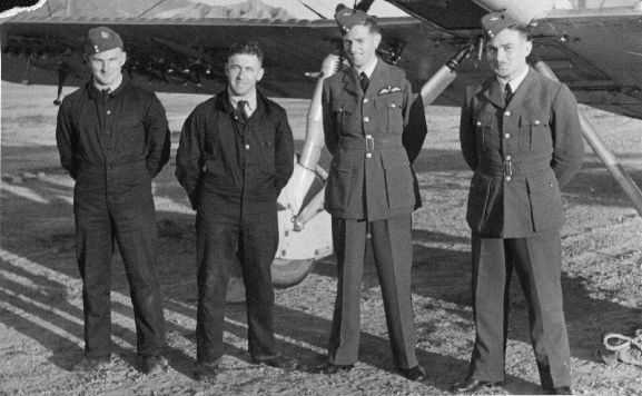 Group standing in front of Vildebeest NZ102 at Rongotai aerodrome during the Air Pageant.
L-R: unknown (Rigger), Aircraftman 1 Tucker (Fitter),  Pilot Officer LH Trent, Acting Pilot Officer Rankin.