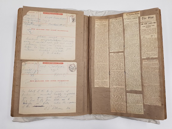 Captain Euan Dickson's personal scrapbook, containing congratulatory telegrams and newsclippings of his history-making flight. From the collection of the Air Force Museum of New Zealand.