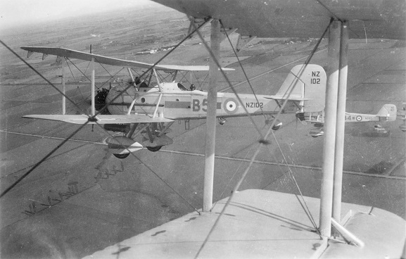 Vildebeest NZ102 in formation with NZ107 over the Canterbury Plains, near RNZAF Station Wigram, 3 April 1938. Image ref MUS050896, Air Force Museum of New Zealand.