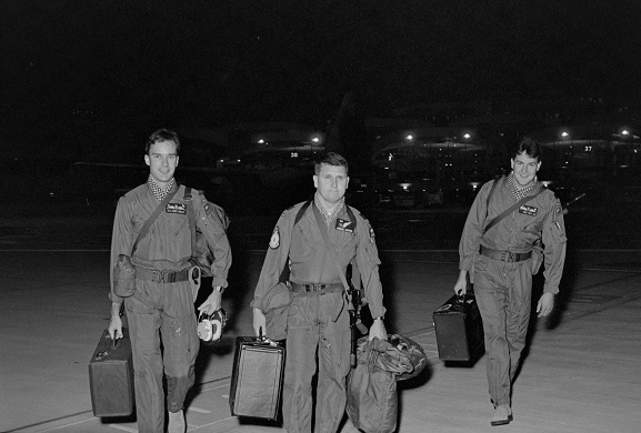 Operation Fresco. No. 40 Squadron crew walking to their aircraft at King Khalid International Airport, Riyadh, Saudi Arabia. 
L-R: Flying Officer PR Tighe-Umbers, Squadron Leader DS Forbes-Dawson, Flight Lieutenant DG Wake. Feb-Mar 1991. Image ref PD18-8-91, RNZAF Official.