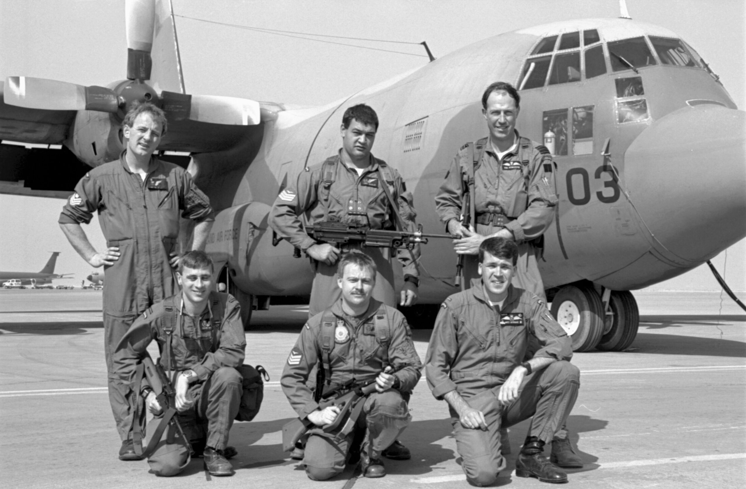 Crew of No. 40 Squadron Hercules NZ7003. Presumed to be at Riyadh, Saudi Arabia, 1991. 
L-R: Back; Flight Sergeant Bruce Melvin, Sergeant J Buchler, Wing Commander Robert Henderson (Detachment Commander and aircraft captain)
Front; Flying Officer Kevin McEvoy, Sergeant Ty Cochran, Flying Officer M Morgan. Image ref PD21-21-91, RNZAF Official.