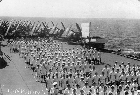 Image from the W Ford personal album collection. 
Royal Navy personnel and RNZAF Corsairs on the flight deck of HMS 'Glory', March 1946. Image ref ALB922911019, Air Force Museum of New Zealand.