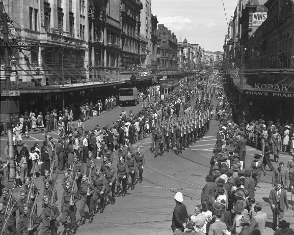 No. 14 Squadron personnel parading along Queen Street, Auckland, before leaving for Japan for Occupation duties. 7 March 1946. Image ref ArdG1176-46, RNZAF Official.
