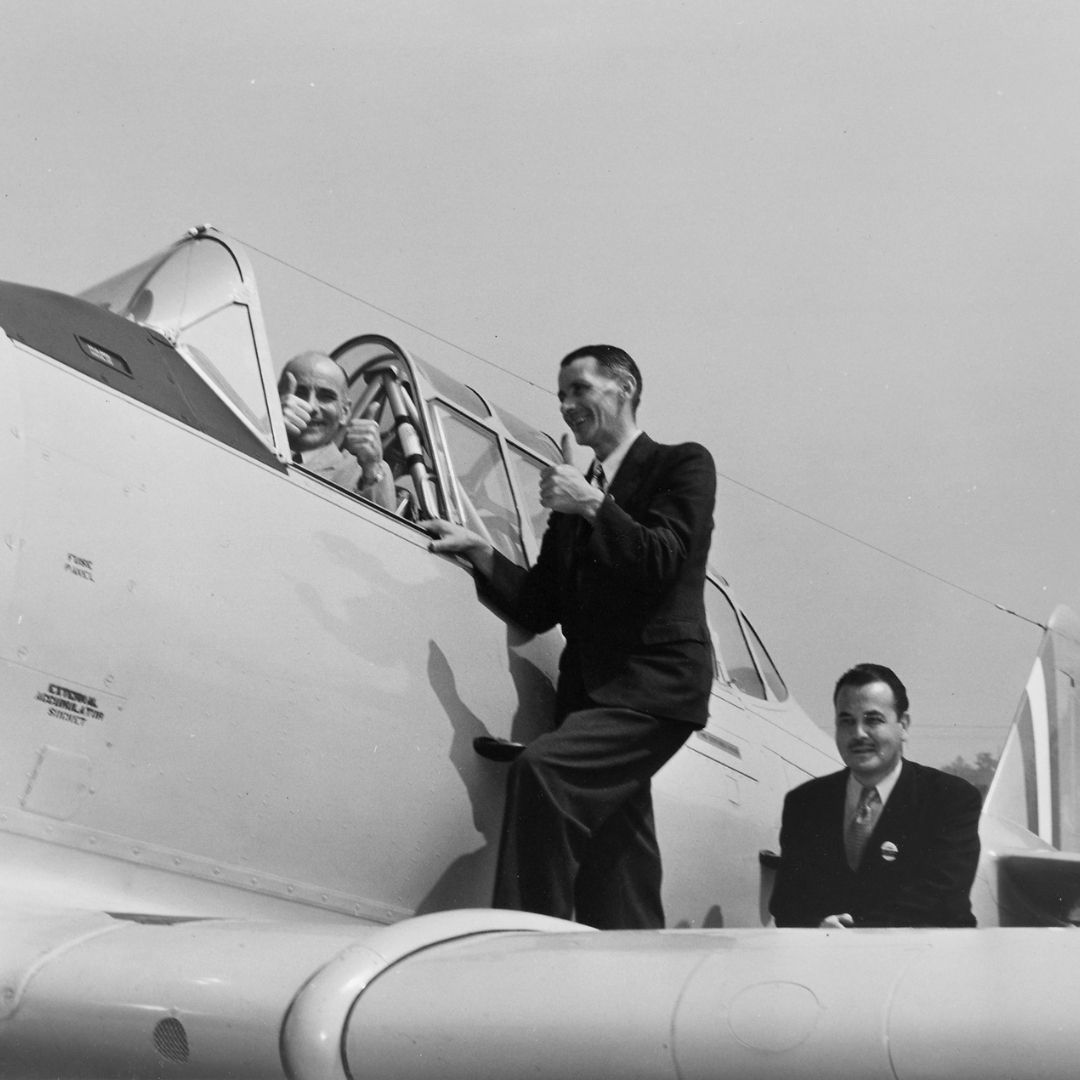 Albert Marsden (in cockpit) sitting in the 1000th North American Harvard produced for the RAF in 1941