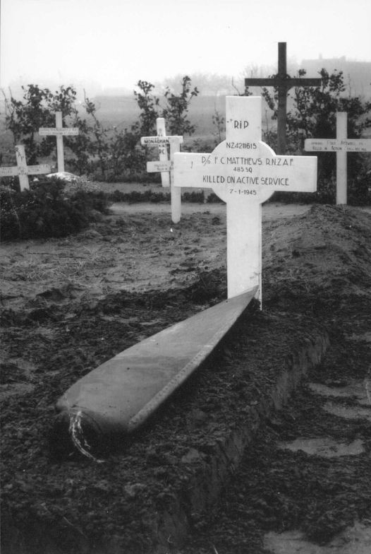 Temporary grave marker of P/O F.C. Matthews with spitfire propellor, Holland