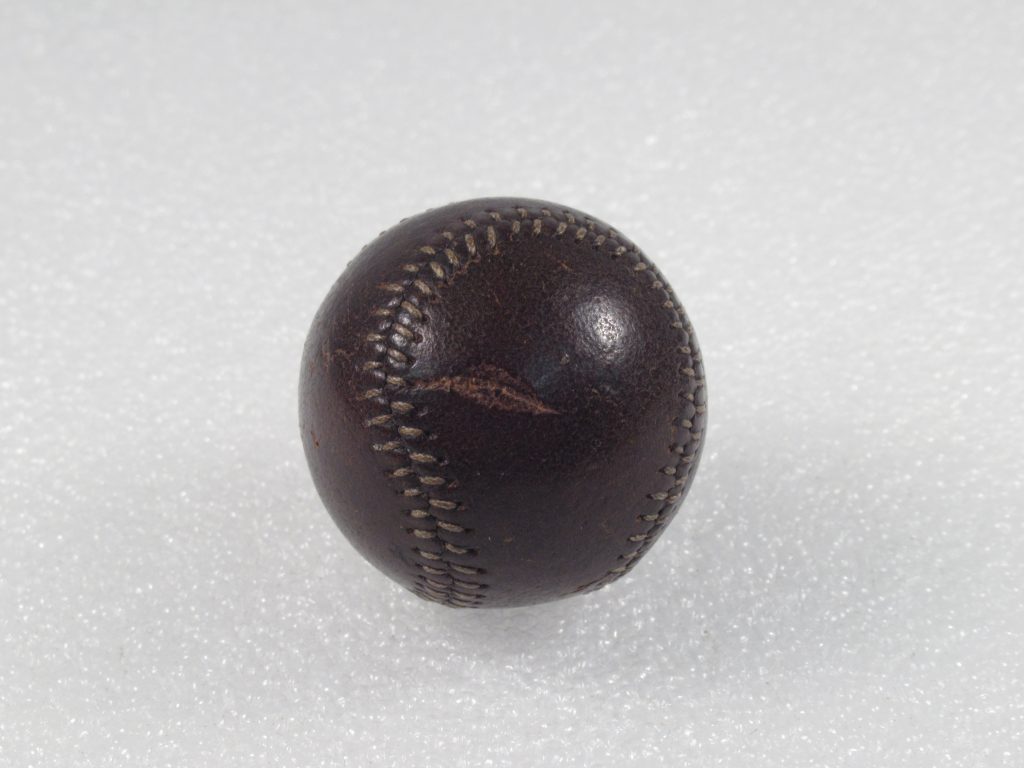 brown-leather-golf-ball