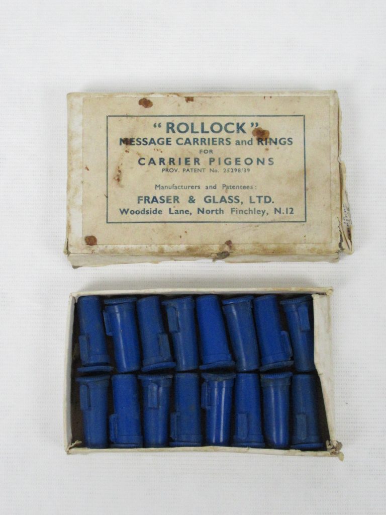 A box of carrier pigeon message capsules